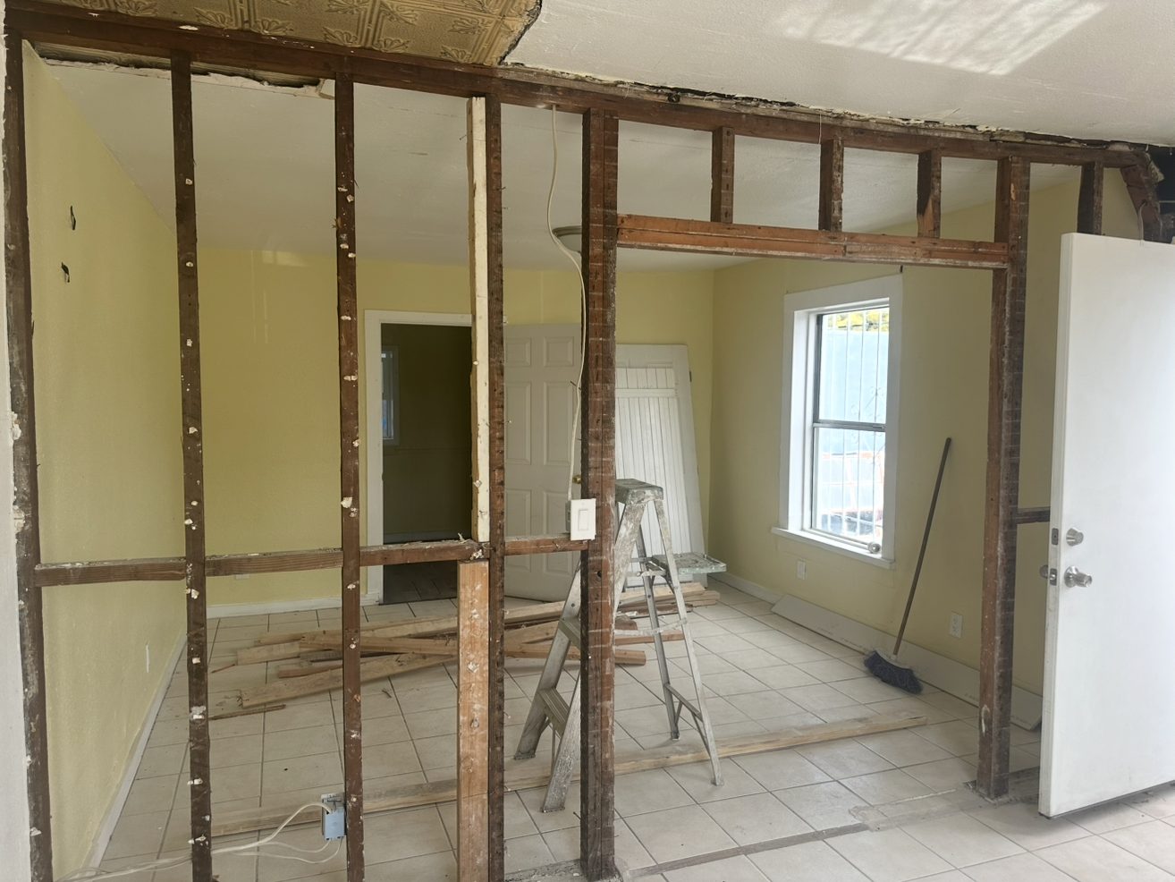 During: Workers rebuilding the exterior